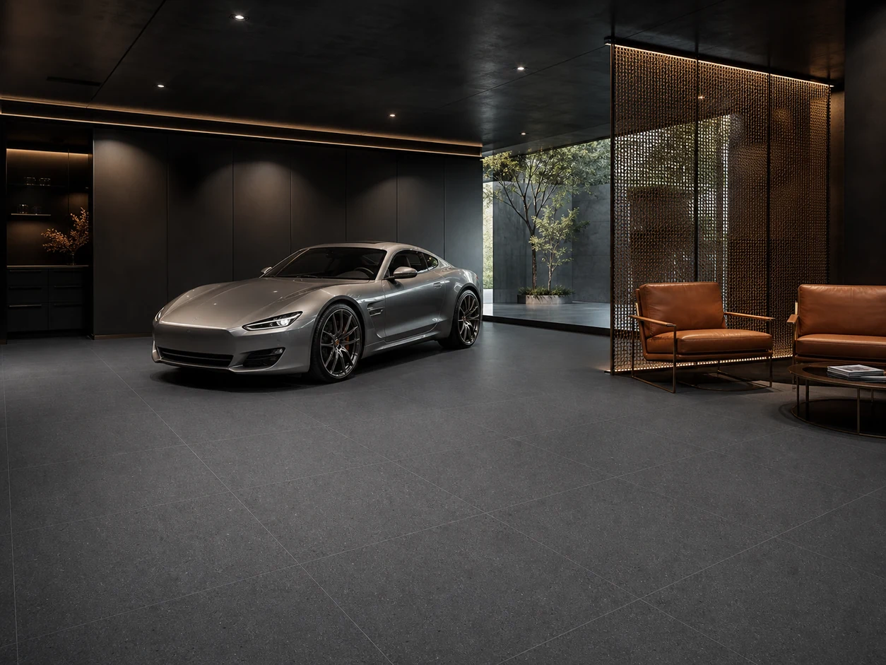 Stonetech – Stoneblack porcelain tile in prestige automotive private-delivery suite