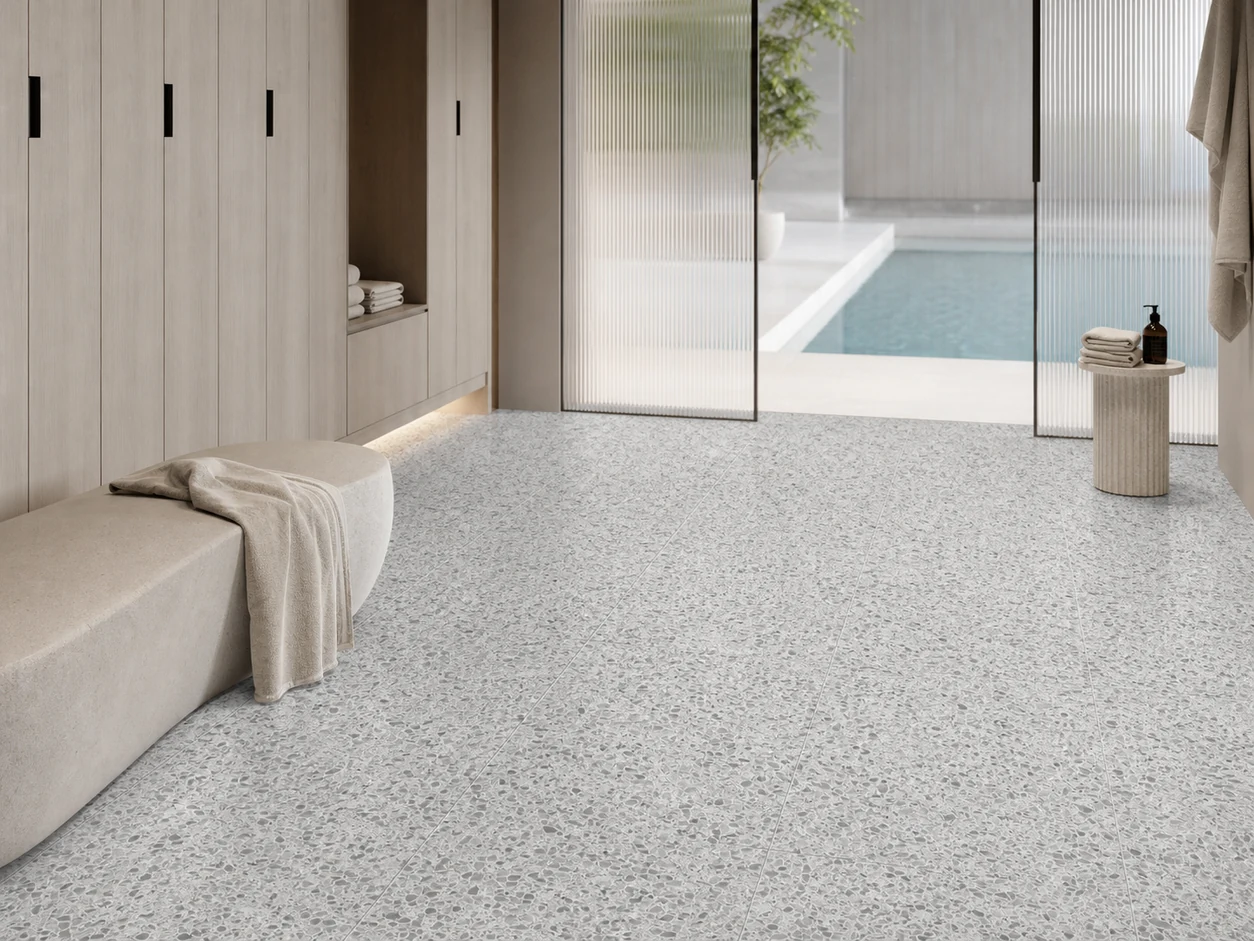Terrazzo – Pearl porcelain tile in residential pool changing lounge