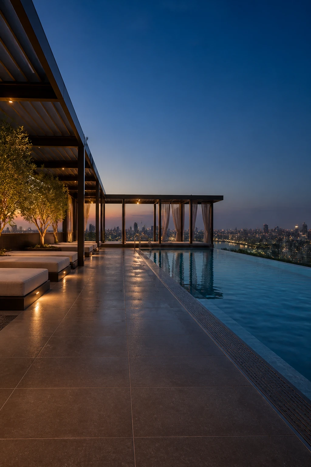 Timeless – Charcoal porcelain tile in rooftop night pool terrace